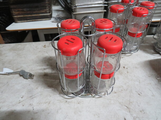Stainless Steel Table Top Holder With 8 Cheese/Pepper Shakers. - Image 1 of 2