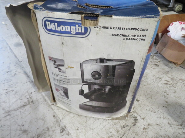 One NEW DeLonghi Espresso Machine.