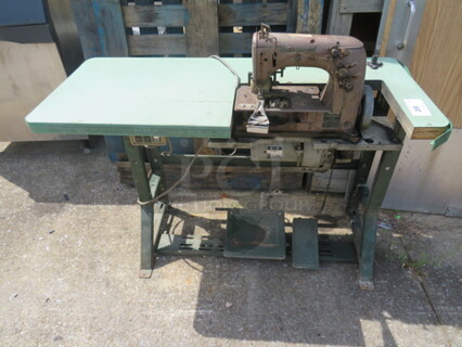 One Lewis Union Special Sewing Machine On A Table. #51300-2. 48X20X40