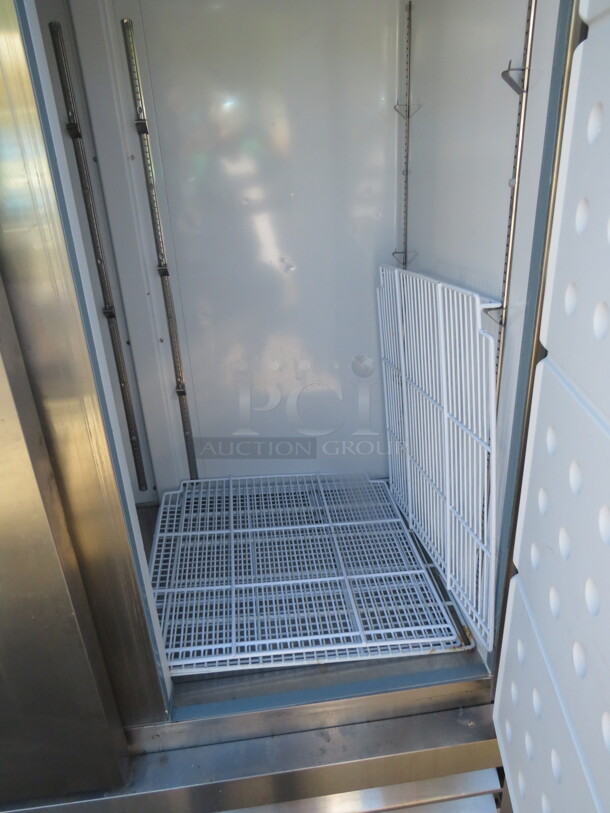 One Artic Air 2 Door Freezer With 4 Racks On Casters. Model# AF49X.  53.5X33X83. $3545.00. - Image 4 of 4