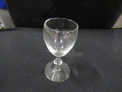 One Lot Of 26 Stem Glasses.