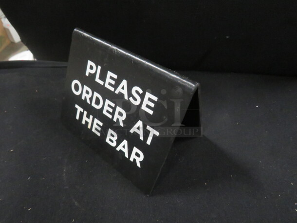 PLEASE ORDER AT THE BAR  Sign. 4XBID