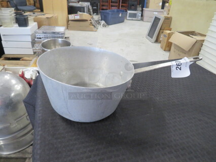 One Aluminum 7 Quart Vollrath Sauce Pan.