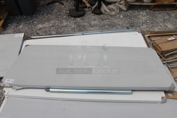 BRAND NEW SCRATCH AND DENT! Regency 600T3072G Commercial Stainless Steel Disassembled Work Table With Undershelf And Galvanized Legs. - Image 1 of 6