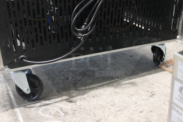 BRAND NEW SCRATCH AND DENT! 2023 KoolMore RIF-1D-SS Stainless Steel Commercial Single Door Reach In Freezer w/ Poly Coated Racks on Commercial Casters. 115 Volts, 1 Phase. Tested and Working! - Image 7 of 7