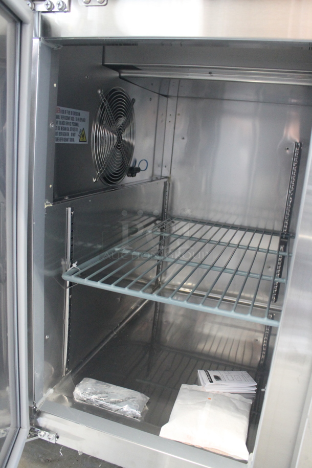 BRAND NEW SCRATCH AND DENT! 2023 Avantco 178SSPPT260 Stainless Steel Commercial Pizza Prep Table on Commercial Casters. 115 Volts, 1 Phase. Tested and Does Not Power On - Image 6 of 9