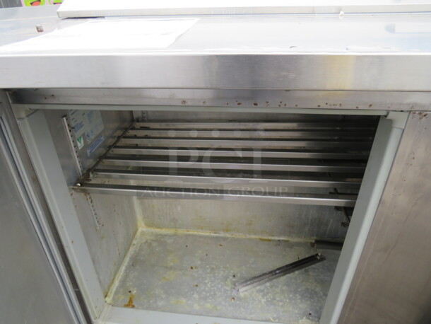 One McCall 2 Door Refrigerated Prep Table On Casters. 115 Volt. Model# D-15-16. 60X30X43. Working Not Cold. - Image 3 of 3