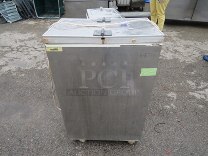 One WORKING Excellence Freezer On Casters. 23.5X15.5X37