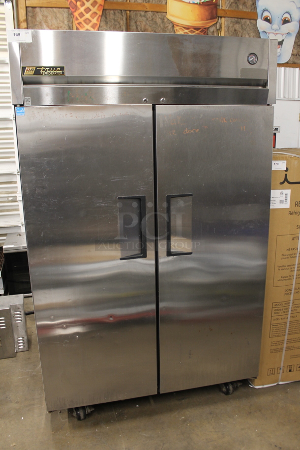 2013 True TG2R-2S Stainless Steel Commercial 2 Door Reach In Cooler w/ Poly Coated Racks on Commercial Casters. 115 Volts, 1 Phase. Tested and Working! - Image 1 of 6