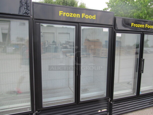 One True 2 Door Glass Display Freezer With 8 Racks, On Casters. Model# GDM-49F 115/208-230 Volt. 1 Phase. Not Tested.  54X30X82