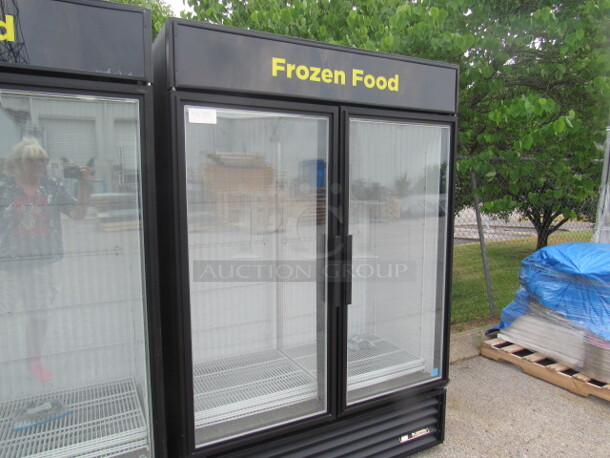 One True 2 Door Glass Display Freezer With 8 Racks. Model# GDM-49FLD. 115/208-230 Volt. 1 Phase. Working Not Cold. 54X30X78