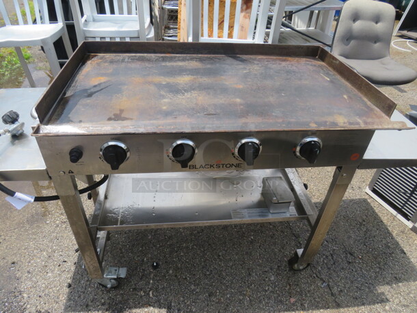 One Blackstone 36 Inch Propane Portable Griddle On Casters. Model# 1560. 62X22X35. - Image 2 of 3
