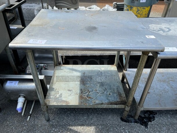 Stainless Steel Table w/ Under Shelf. 36x30x35.5
