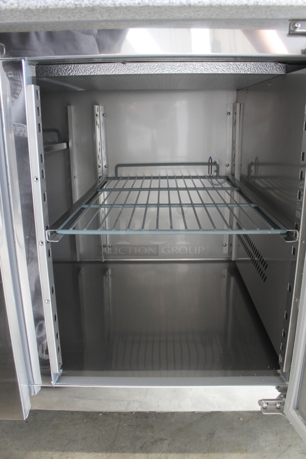 BRAND NEW SCRATCH AND DENT! 2023 Avantco 178SSPPTG60HC Stainless Steel Commercial 60" 2 Door Stone Top Refrigerated Pizza Prep Table. 115 Volts, 1 Phase. Tested and Working! - Image 8 of 9