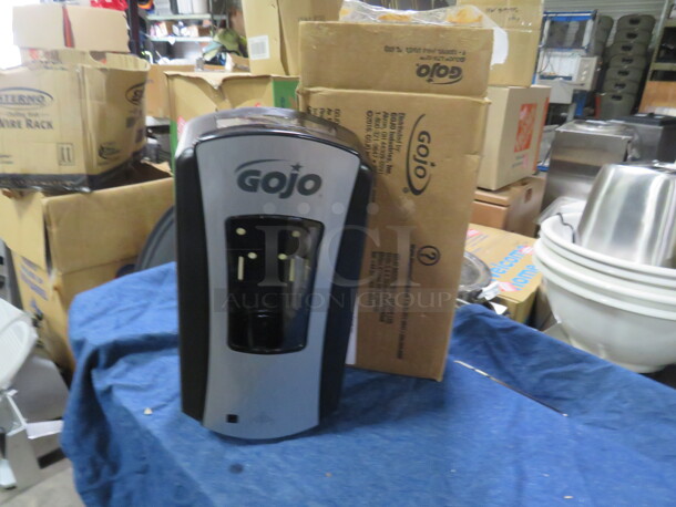 One NEW GoJo Soap Dispenser.