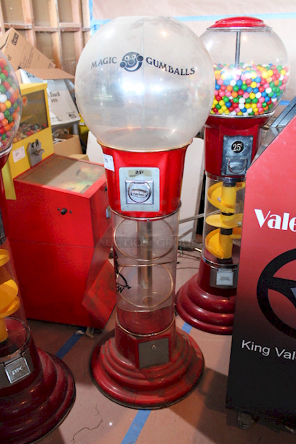 SWEET! World Famous Magic Gumball International 5ft Large Spin and Drop Commercial Gumball Machine with Stand - Quarter Activated, Classic Red. TESTED! Machinery Works. Minor Damage to The Fiberglass Around The Center Of Machine. Brass/Metal Collar May Need A Screw. Very Easy Fix. Missing The Lid.  - Image 1 of 6