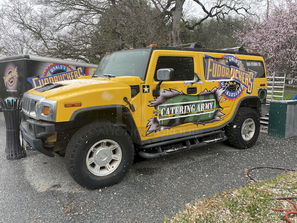 VROOM VROOM! Yellow  Hummer H2 4 Door, 4x4 / 4 Wheel Drive. 6.0L 8 Cylinder Engine, Includes Tow Package. Minor Damage. The Winning Bidder Will Have The Option To Have It Fixed (for approx $1500) Or Receive It As Is. The Vehicle May Need New Paint As The Fuddruckers Wrap Will Need To Be Removed.