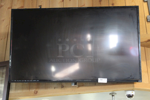 NICE SETUP! 70" Samsung Flat Screen TV With Mount. Winner Responsible For Removal.