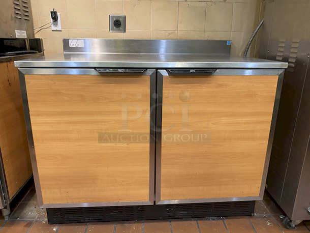 10 out of 10! Duke RUF-48 M 2 Door Refrigerated Work Counter on Commercial Casters. 120volt

Tested. Perfect Working Order. 

30"d x 48"w x 36-1/2"h. 
 - Image 2 of 6