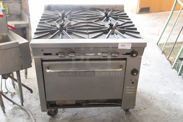 AMAZING! Commercial 4 Burner Stock Pot Range With Oven Base On Commercial Casters. 430.00lbs.