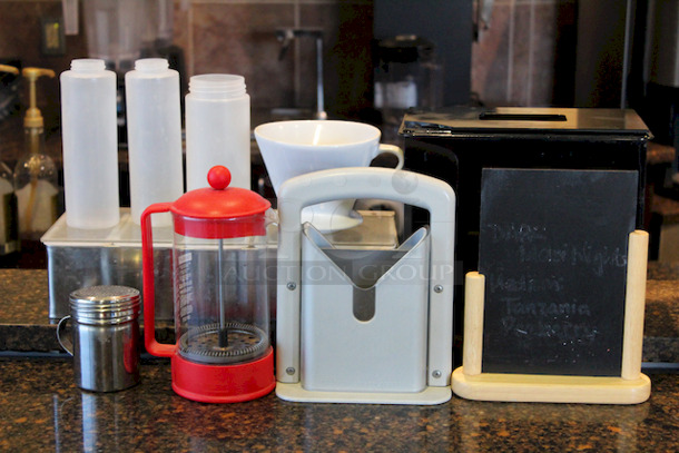 ALL FOR ONE! Lot Includes: French Press, Bagel Slicer, Pour Over, Squeeze Bottles, Tip Box, Bar Top Garnish Holder. 