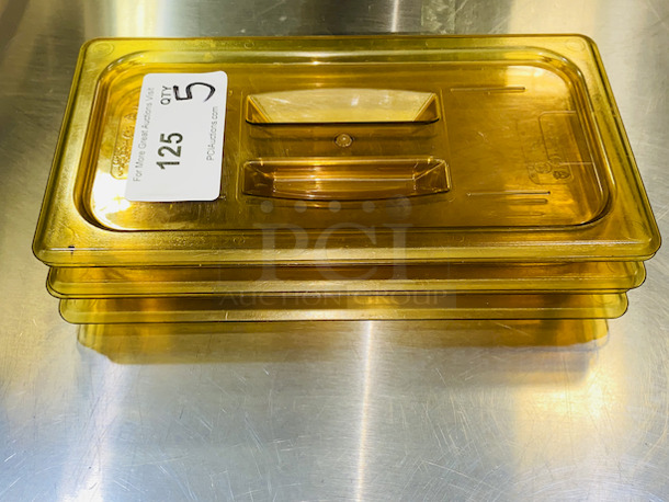 SWEET! Cambro High Temp Amber EN631-1 1/3 Pan Lids.  

5x Your Bid - Image 1 of 3
