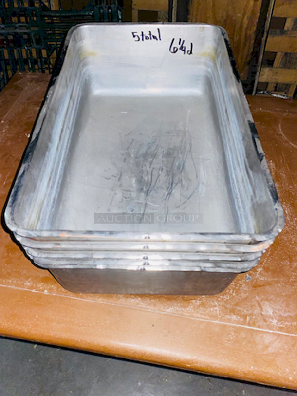 EVERYTHING ON THE SHELVES! Includes 8 Perforated Full Size Pans (2” Deep”), 46 Stainless Steel Milkshake Cups, 3 Full Size Pans (4” Deep), (3) 6” Deep 1/3 Pans, ¼ Pan, 4” Deep Full size Pans, (79)  Aladin Temp-Rite Induction Heated Dishes With (39) Covers and (25) Bowls,  San Jamar SAF-T-ICE Tote.  - Image 4 of 12