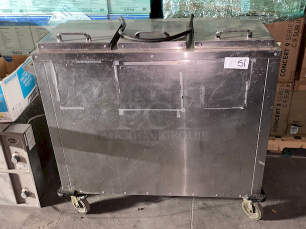 SWEET! Aladdin Temp-Rite DH08 3 Columns Dish Heater, Fits Up To 9 inch Plates. 

In Working Condition When tested. 
208V, 240V, Single Phase, 15.9Amps, 20Amps, 60HZ, 3-wire

47 1/8"x24 1/2"x42 13/16"
300 lbs

3 dispensing columns
Durable and attractive stainless steel cabinet
Fully insulated heater compartment
Four swivel 5" casters, two with brakes, for ease of maneuverability and stability
Convenient push/pull handle
Corner bumpers
Tight fitting lid design seals without gasket
Eight foot long, three wire, grounded electrical supply cord and plug with strain relief - Image 1 of 9