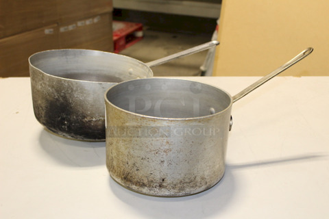2 Aluminum Pots (1) 10-1/2x7; (1) 12x7.