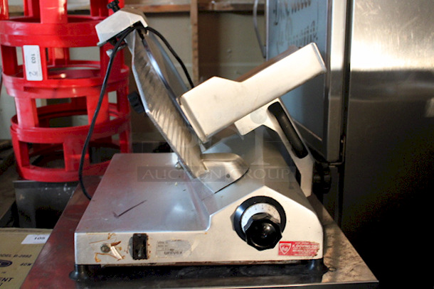 DO NOT PASS THIS BY! Univex 7512 Manual Meat & Cheese Slicer w/ 12" Blade In OUTSTANDINGLY GOOD CONDITION!! Belt Driven, Aluminum, 1/2 hp, WORKING! 120v/20hz/1phase 25"x21-1/2x20-3/4 87lbs - Image 3 of 6