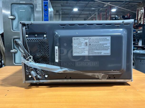 Brand New Scratch & Dent Sharp - 1.1 cu ft Stainless Countertop Microwave with 1000 watts - Image 5 of 6