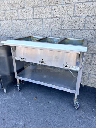 Late Model Duke E303 44 inch Hot Food Table w/ (3) Wells & Cutting Board, On Casters 115v/1ph Working 