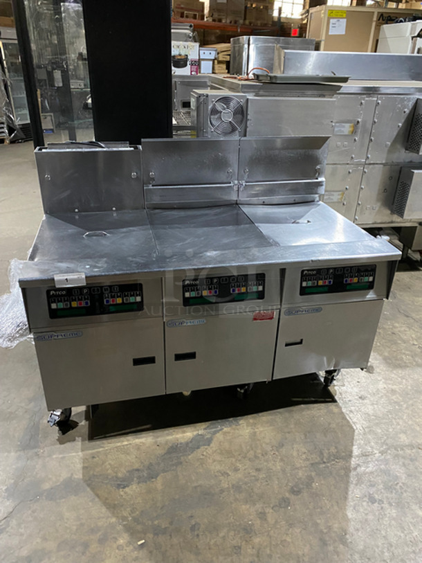 SWEET! Pitco Frialator Commercial Natural Gas Powered 3 Bay Deep Fat Fryer! With Backsplash! With Fryer Covers! All Stainless Steel! On Casters! Working When Removed! Model: SSH60W SN: G13LC064141 115V 50/60HZ