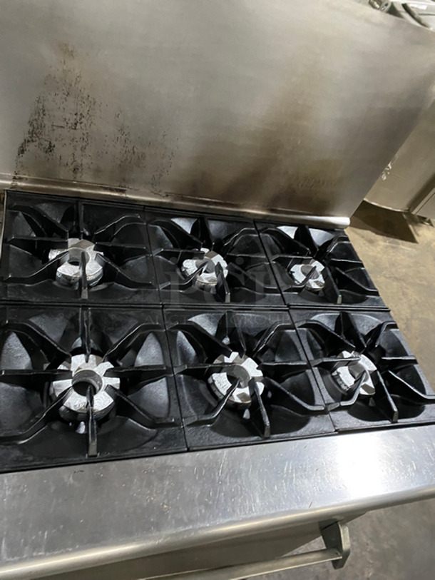 Sweet! Imperial Commercial Natural Gas Powered 6 Burner Stove With Left Side Flat Top Griddle! 2 Full Size Ovens Underneath! With Metal Oven Racks! Left Side Splash And Raised Back Splash!  All Stainless Steel! On Casters! - Image 7 of 11