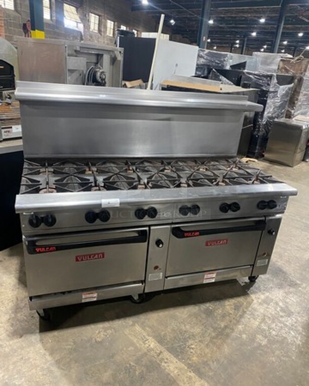 Vulcan Commercial Natural Gas Powered 12 Burner Stove! With Raised Back Splash And Salamander Shelf! With 2 Oven Underneath! All Stainless Steel! On Casters! WORKING WHEN REMOVED! Model: G72SS1AA SN: 659011300