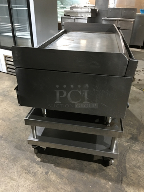 GORGEOUS! Wolf Heavy Duty Commercial Flat Griddle! On Heavy Duty Equipment Stand! With Back And Side Splashes! All Stainless Steel! On Casters! Model: IRC60C SN: 481606006 120V 60HZ 1 Phase - Image 2 of 9
