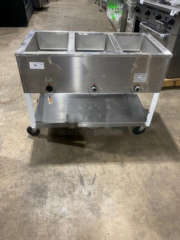 Duke Commercial Electric Powered 3 Well Steam Table! With Storage Space Underneath! All Stainless Steel! On Casters! Model: E303M SN: 12063086 208V 60HZ 3 Phase