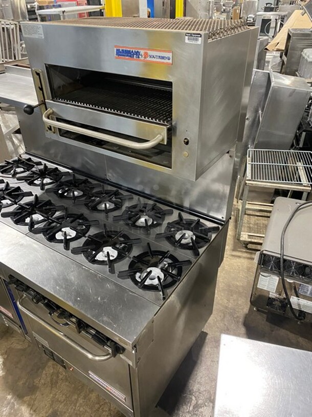 WOW! Hussmann Southbend Stainless Steel Commercial 12 Burner Stove! With One Full Size Convection Oven And Full Size Oven! With Raised Back Splash And Salamander Overhead! On Commercial Casters! Working When Removed! - Image 2 of 12