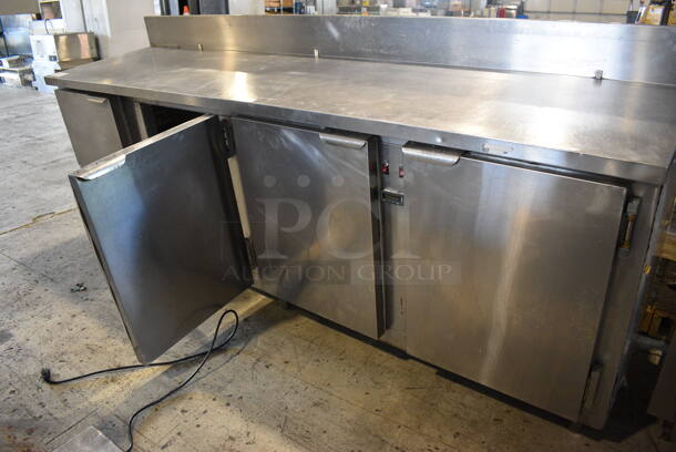 Stainless Steel Commercial Work Top 4 Door Cooler w/ Backsplash. 96.5x24.5x43. Tested and Does Not Power On
