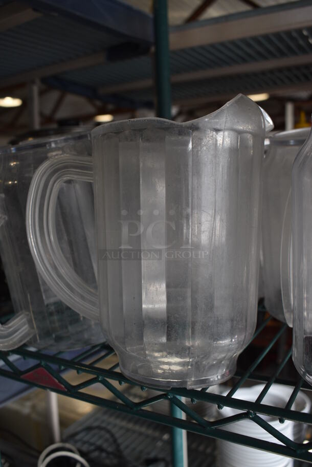 ALL ONE MONEY! Lot of 16 Clear Poly Pitchers! 7x5x8