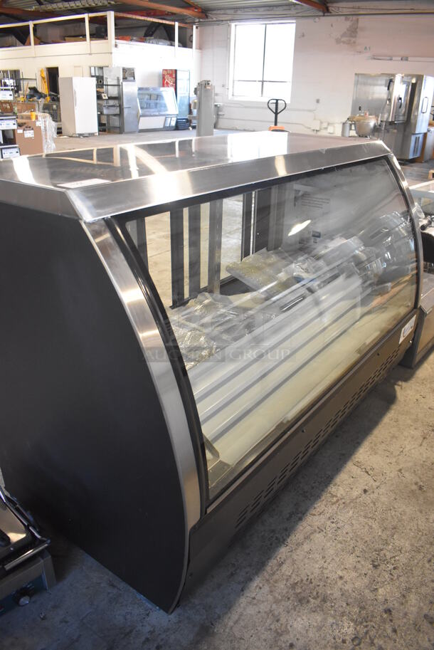 BRAND NEW SCRATCH AND DENT! Avantco 178DLC64HCB Metal Commercial Floor Style Black Curved Glass Refrigerated Deli Case Merchandiser. 115 Volts, 1 Phase. 64x33x43. Tested and Working!