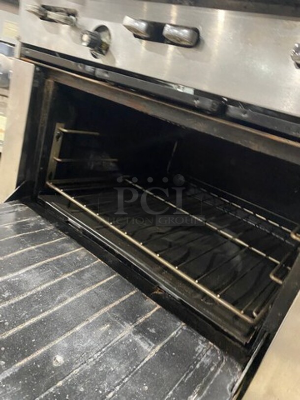 Garland Commercial Natural Gas Powered 6 Burner Stove! With Raised Back Splash! With Oven Underneath! Metal Oven Rack! All Stainless Steel! On Casters! - Image 7 of 9