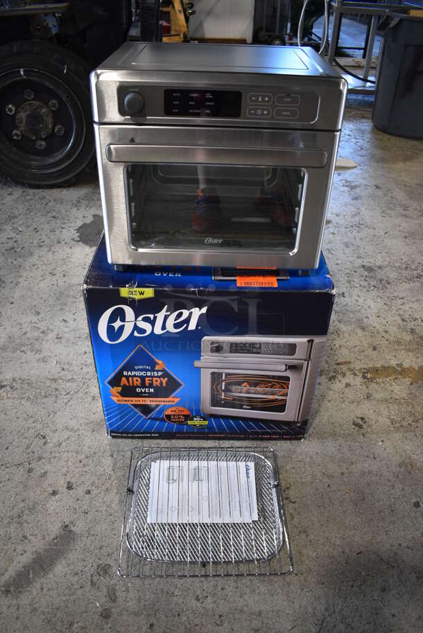 BRAND NEW SCRATCH AND DENT! Oster TSSTTVDAF2 Metal Countertop Digital Air Fry Oven. 120 Volts, 1 Phase. 16x16x14.5