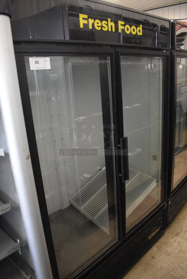 2011 True GDM-49 ENERGY STAR Metal Commercial 2 Door Reach In Cooler Merchandiser w/ Poly Coated Racks. 115 Volts, 1 Phase. 54x32x78. Tested and Powers On But Does Not Get Cold