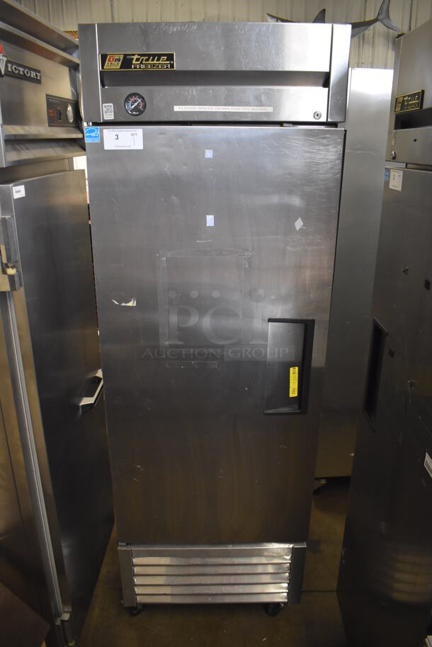 2013 True T-23F ENERGY STAR Stainless Steel Commercial Single Door Reach In Freezer w/ Poly Coated Racks on Commercial Casters. 115 Volts, 1 Phase. 27x30x83.5. Tested and Working!