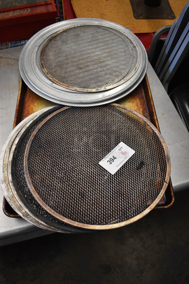 11 Metal Items; 7 Various Mesh Pizza Screens, 2 Pizza Pans and 2 Full Size Baking Pans. Includes 19x19, 16x16, 18x26x1. 11 Times Your Bid! - Image 1 of 4