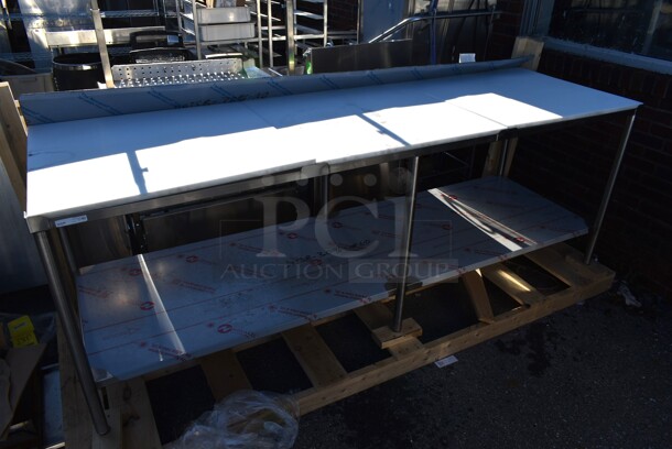 BRAND NEW SCRATCH AND DENT! Stainless Steel Commercial Table w/ Back Splash and Under Shelf. - Image 1 of 3