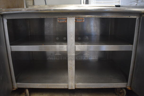 Advance Tabco Stainless Steel Commercial Counter w/ Back Splash, 2 Doors and Under Shelves on Commercial Casters. 48x30x40 - Image 4 of 5