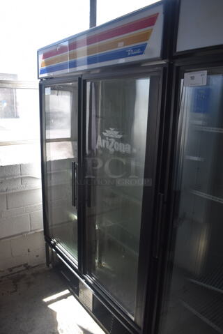 True GDM-49 Commercial 2-Door Glass Merchandiser Cooler With Polycoated Shelves, Black. 115V, 1 Phase. Tested and Powers On But Does Not Get Cold