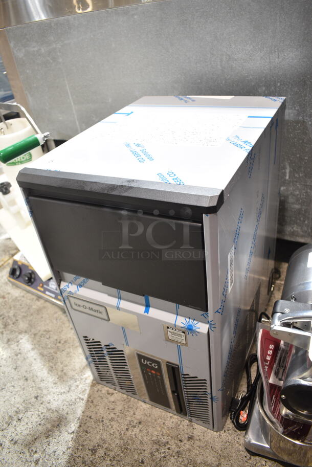 BRAND NEW SCRATCH AND DENT! 2022 Ice-O-Matic UCG 60 A Stainless Steel Commercial Undercounter Gourmet Cube Ice Machine. 115 Volts, 1 Phase.  - Image 3 of 8
